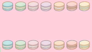 マカロンが並んだピンクの背景画像