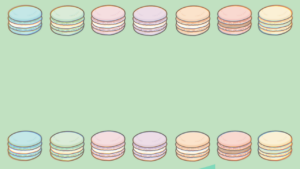 マカロンが並んだ緑色の背景画像